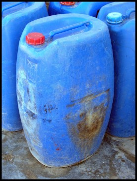 The blue jerry cans often used to transport and store well water.